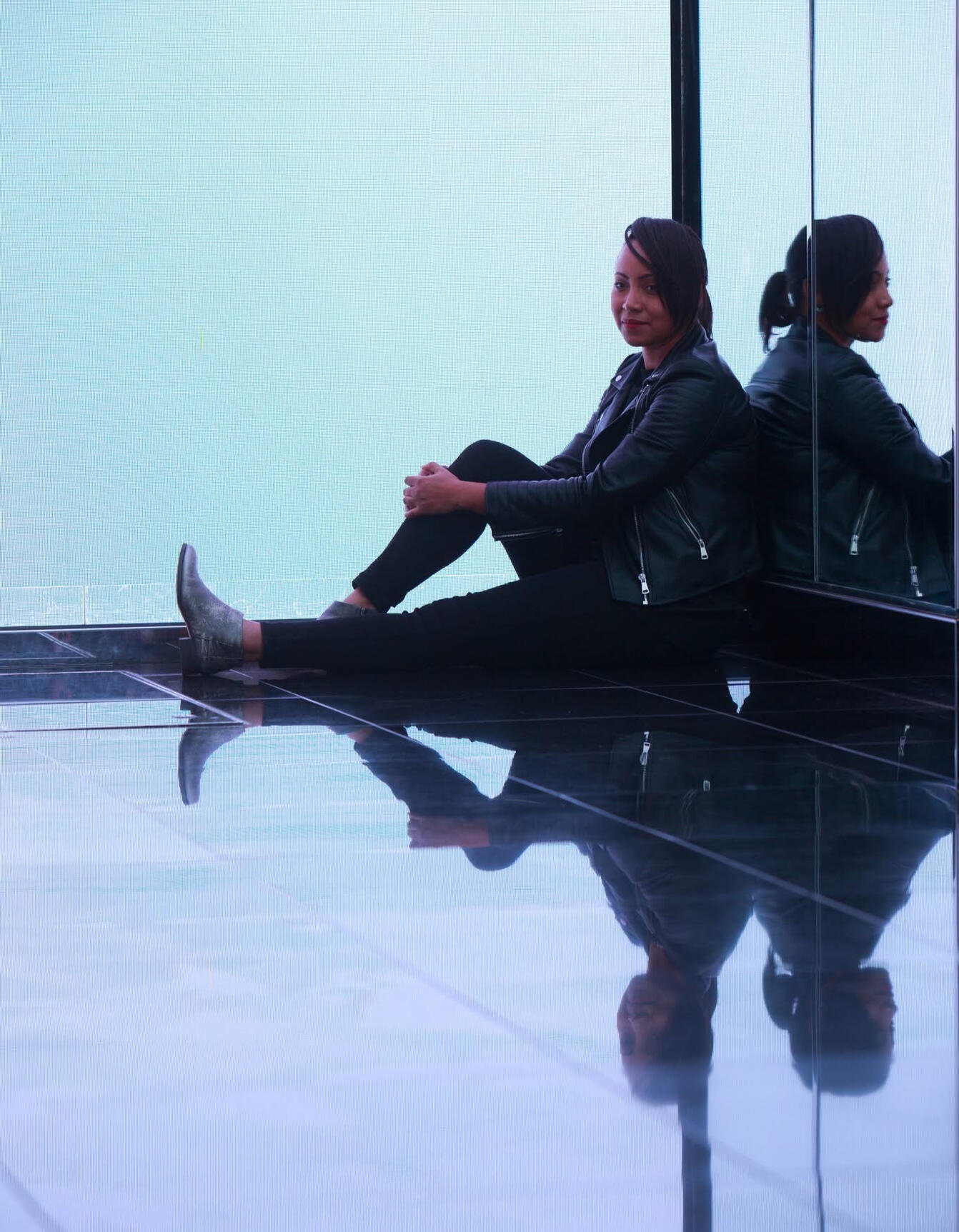 Self portrait sitting by large mirrors. Self portrait sitting by large mirrors.